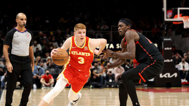 Jan 31, 2022; Atlanta, Georgia, USA; Atlanta Hawks guard Kevin Huerter (3) drives against Toronto Raptors forward Pascal Siakam (43) during the second half at State Farm Arena.